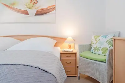 Ein Bett oder Betten in einem Zimmer der Unterkunft Cozy Ankerplatz 61