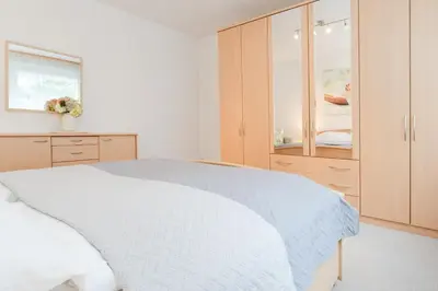 Ein Bett oder Betten in einem Zimmer der Unterkunft Cozy Ankerplatz 61