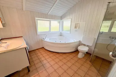 Ein Badezimmer in der Unterkunft Strandblick - Dorf 1 Ferienhaus 10