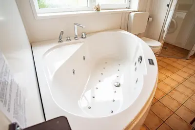 Ein Badezimmer in der Unterkunft Strandblick - Dorf 1 Ferienhaus 14