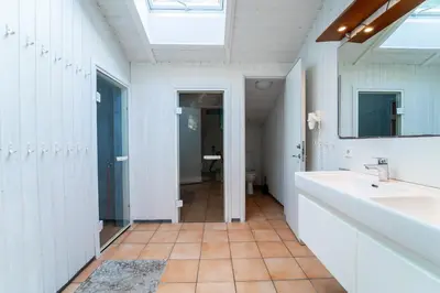 Ein Badezimmer in der Unterkunft Strandblick - Dorf 1 Ferienhaus 25