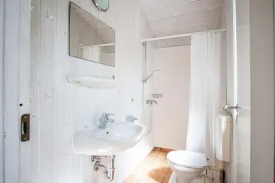 Ein Badezimmer in der Unterkunft Strandblick - Dorf 1 Ferienhaus 09