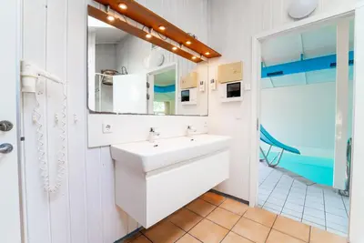 Ein Badezimmer in der Unterkunft Strandblick - Dorf 1 Ferienhaus 02