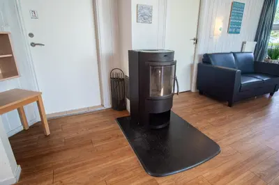 Ein Sitzbereich in der Unterkunft Strandblick - Dorf 1 Ferienhaus 07