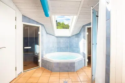 Ein Badezimmer in der Unterkunft Strandblick - Dorf 1 Ferienhaus 07