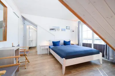 Ein Bett oder Betten in einem Zimmer der Unterkunft Strandpark Sierksdorf H047