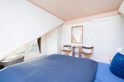 Ein Bett oder Betten in einem Zimmer der Unterkunft Strandpark Sierksdorf H047
