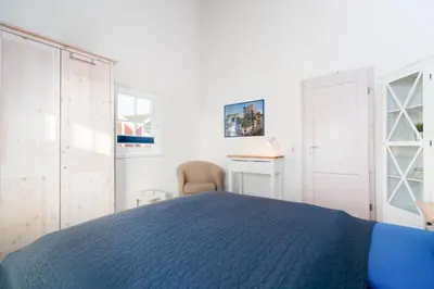Ein Bett oder Betten in einem Zimmer der Unterkunft Strandpark Sierksdorf H047