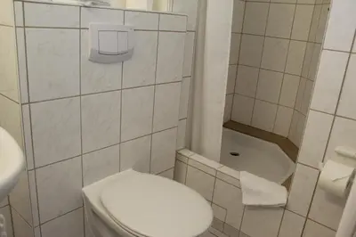 Ein Badezimmer in der Unterkunft Hotel Sonnenklause