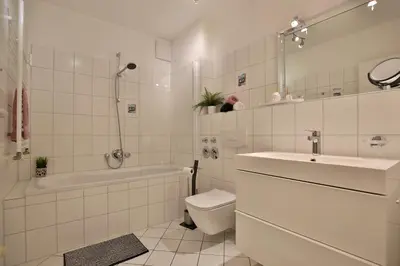 Ein Badezimmer in der Unterkunft Haus Strandstrasse Strandstrasse 150 Haus B Appartement 5
