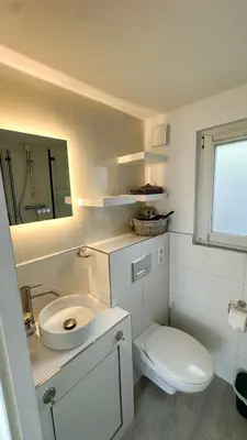 Ein Badezimmer in der Unterkunft KüstenNest gepflegte großzügige Ferienwohnung Nähe Ostsee mit Garten