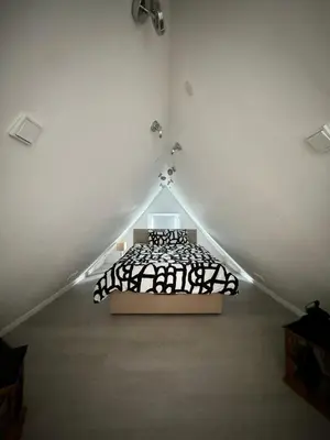 Ein Bett oder Betten in einem Zimmer der Unterkunft Ferienhaus Achterhus für Familien & Homeoffice
