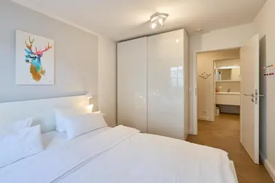 Ein Bett oder Betten in einem Zimmer der Unterkunft Ferienwohnung Robbe Timmendorfer Strand