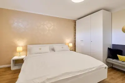 Ein Bett oder Betten in einem Zimmer der Unterkunft Bel Etage Bergstr 35 Timmendorfer Strand