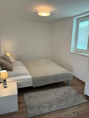 Ein Bett oder Betten in einem Zimmer der Unterkunft OstseeGlück