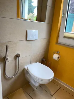 Ein Badezimmer in der Unterkunft Ferienbungalow SOL