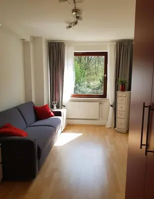 Ein Sitzbereich in der Unterkunft Schöne 120-qm-Ferienwohnung - Sonnenterrasse - Stadtgrenze Lübeck
