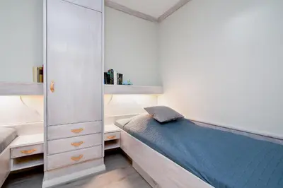 Ein Bett oder Betten in einem Zimmer der Unterkunft Ferienpark Sierksdorf App 314
