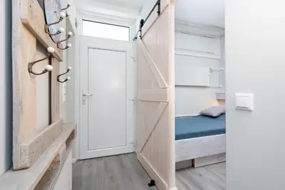 Ein Bett oder Betten in einem Zimmer der Unterkunft Ferienpark Sierksdorf App 314