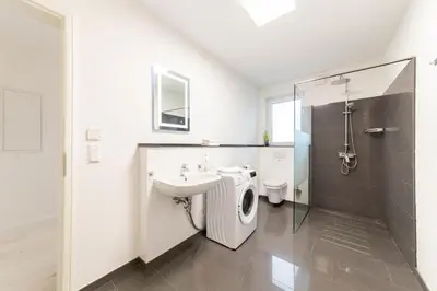 Ein Badezimmer in der Unterkunft Ferienhaus Admirals Huus Niendorf