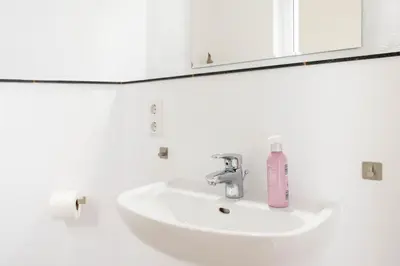 Ein Badezimmer in der Unterkunft Ferienhaus Admirals Huus Niendorf
