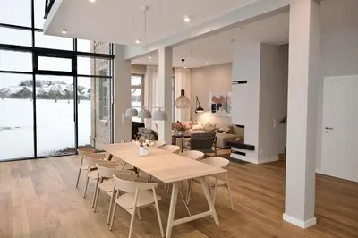 Ein Sitzbereich in der Unterkunft Schöne Aussicht Rosenhagen Haus 5