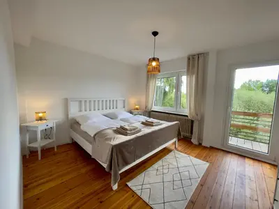 Ein Bett oder Betten in einem Zimmer der Unterkunft Haus Königsee 