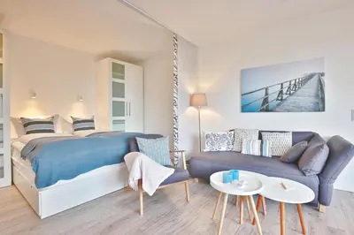 Ein Bett oder Betten in einem Zimmer der Unterkunft Gorch Fock Ring Balticview Appartement 19