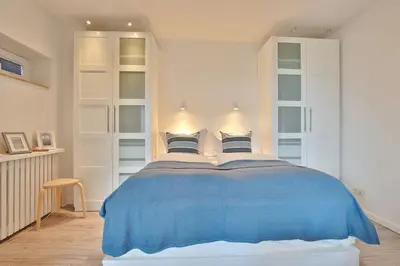 Ein Bett oder Betten in einem Zimmer der Unterkunft Gorch Fock Ring Balticview Appartement 19