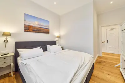 Ein Bett oder Betten in einem Zimmer der Unterkunft Villa Daheim Travemünde
