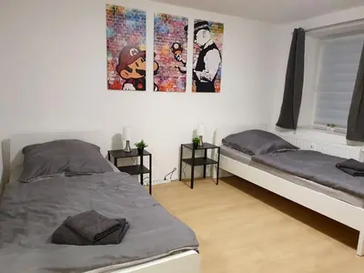 Ein Bett oder Betten in einem Zimmer der Unterkunft Beautiful Apartment in Bad Oldesloe