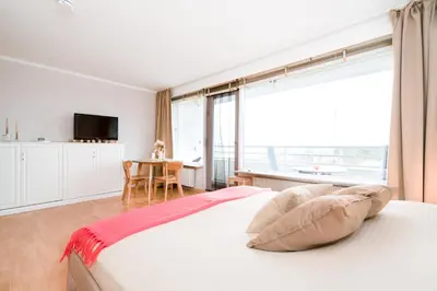 Ein Bett oder Betten in einem Zimmer der Unterkunft Ferienpark Sierksdorf Carlas Casa