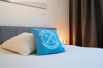Ein Bett oder Betten in einem Zimmer der Unterkunft Treibholz