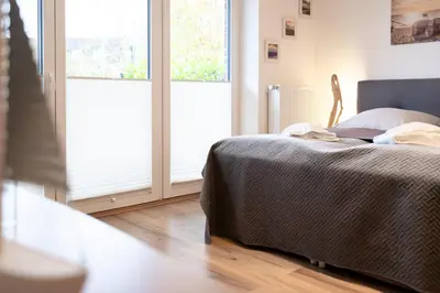Ein Bett oder Betten in einem Zimmer der Unterkunft App Meerzeit