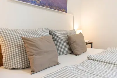 Ein Sitzbereich in der Unterkunft Ferienwohnung Wellenbrecher Niendorf