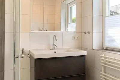 Ein Badezimmer in der Unterkunft Ferienhaus Haffwiese - Haffkrug
