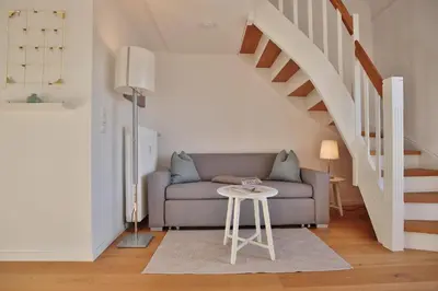 Ein Sitzbereich in der Unterkunft Haus Miramar Treffert Appartement 36