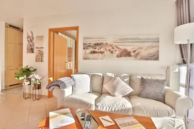 Ein Sitzbereich in der Unterkunft Haus Seesand Appartement 5