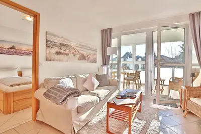 Ein Sitzbereich in der Unterkunft Haus Seesand Appartement 5