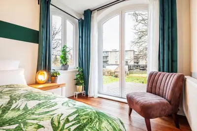 Ein Bett oder Betten in einem Zimmer der Unterkunft Eco-Apartment - Nähe Trave mit Terrasse