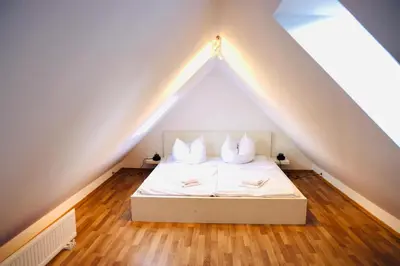 Ein Bett oder Betten in einem Zimmer der Unterkunft Apartments Meerzeit A