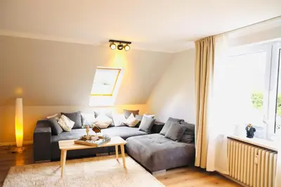 Ein Sitzbereich in der Unterkunft Apartments Meerzeit A