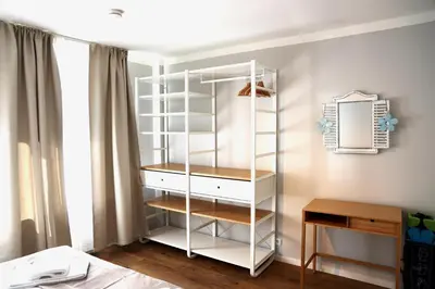 Ein Bett oder Betten in einem Zimmer der Unterkunft Apartments Meerzeit B