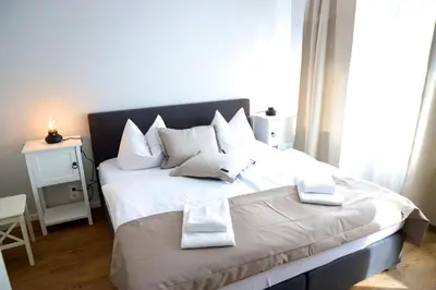 Ein Bett oder Betten in einem Zimmer der Unterkunft Apartments Meerzeit B