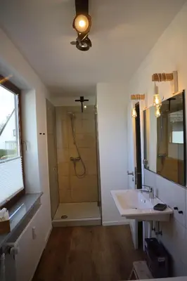 Ein Badezimmer in der Unterkunft Apartments Meerzeit B