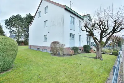 Ein Garten an der Unterkunft Ferienhaus Dornkampstraße 1 a Ferienhaus Dornkampstrasse 1a Appartement 2