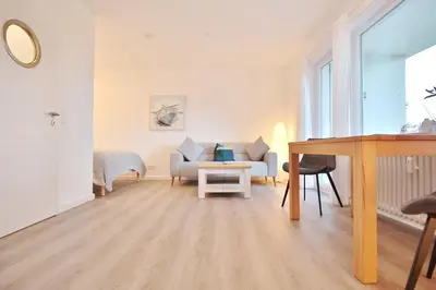 Ein Sitzbereich in der Unterkunft Ferienhaus Dornkampstraße 1 a Ferienhaus Dornkampstrasse 1a Appartement 2