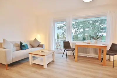 Ein Sitzbereich in der Unterkunft Ferienhaus Dornkampstraße 1 a Ferienhaus Dornkampstrasse 1a Appartement 2