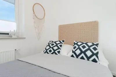 Ein Bett oder Betten in einem Zimmer der Unterkunft Alte Bergstraße 11 Bude 7