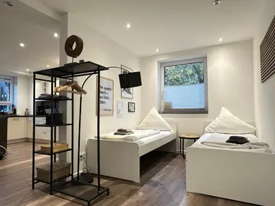 Ein Bett oder Betten in einem Zimmer der Unterkunft M&K Homes Eleganter Neubau zwischen Hamburg&Ostsee mit Parkplatz
